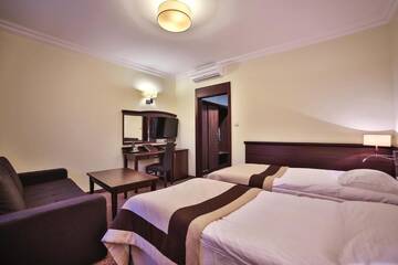 Фото номера Двухместный номер с 2 отдельными кроватями Отель Hotel Biały Dom г. Czerwionka 8