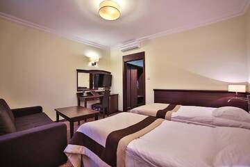 Фото номера Двухместный номер с 2 отдельными кроватями Отель Hotel Biały Dom г. Czerwionka 4